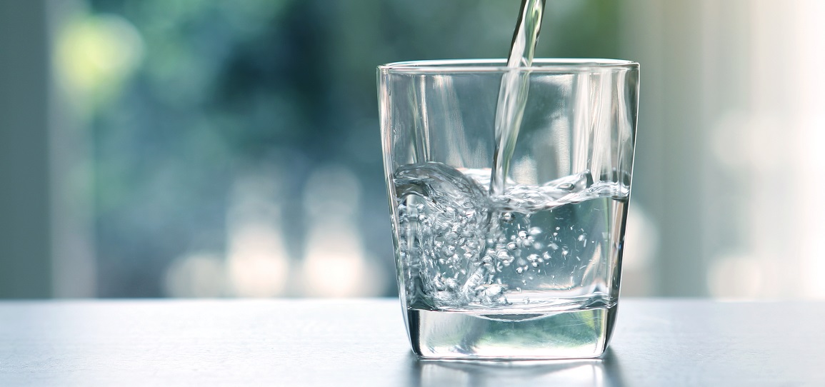 pouring water into a glass - can you drink softened water