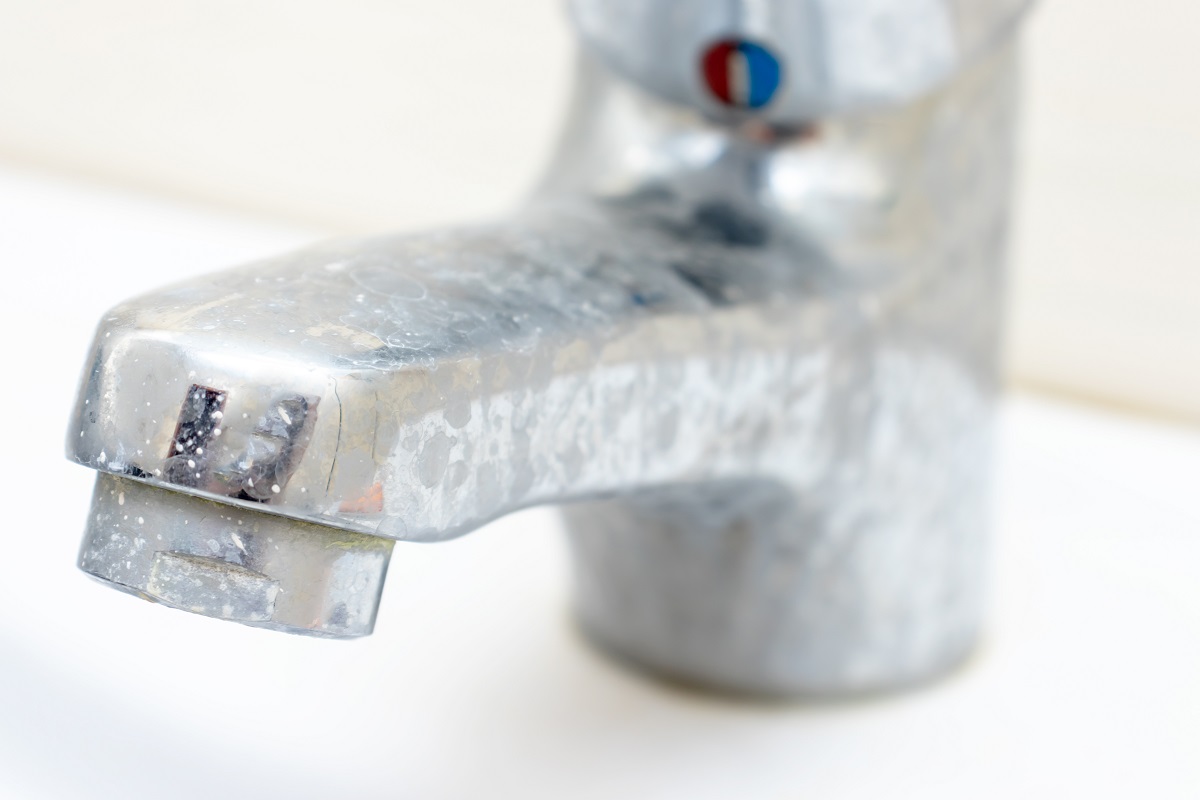 faucet with hard water stains - discount water softeners